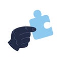 Hand holding piece of the puzzle. Teamwork business solution concep